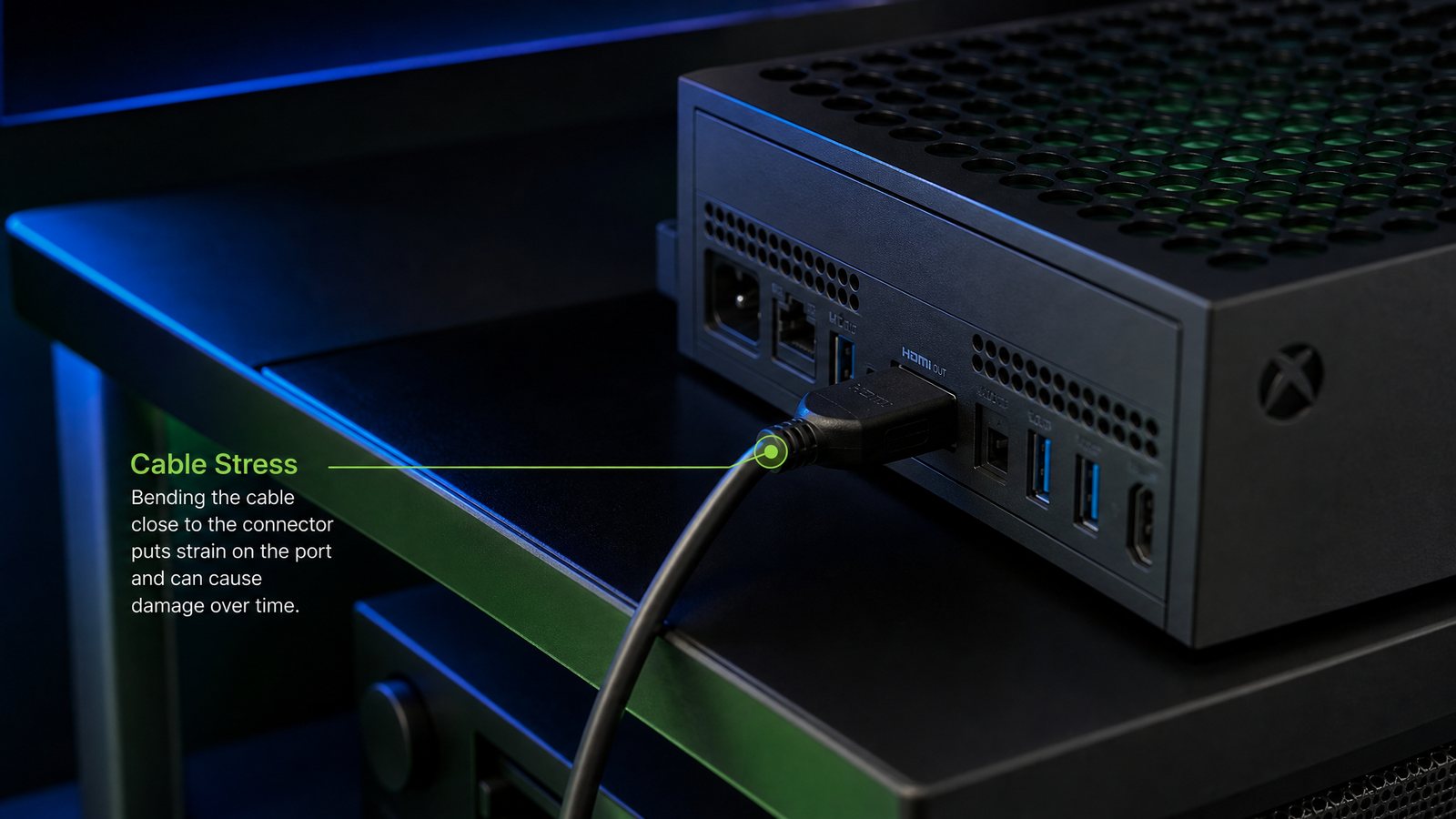 Close-up of an HDMI port and cable being handled with care